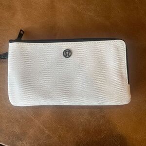 Lululemon curved wristlet, textured bag, white
